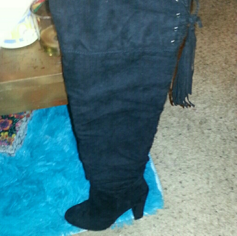 Thigh high black boots
